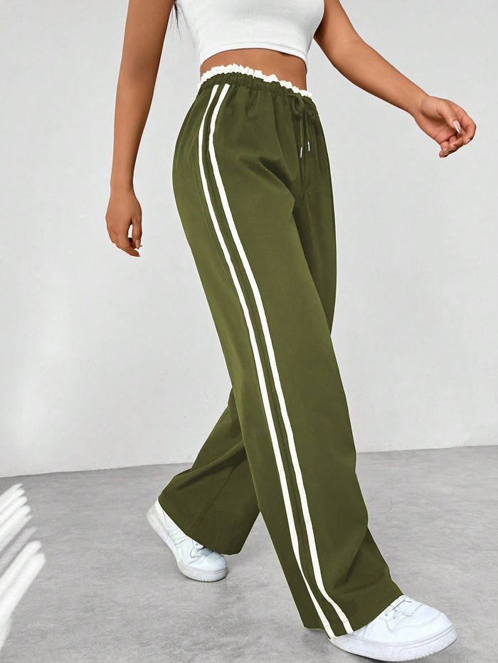 Madison | Women’s Sporty High-Waisted Jogger Pants in Black with White Stripes