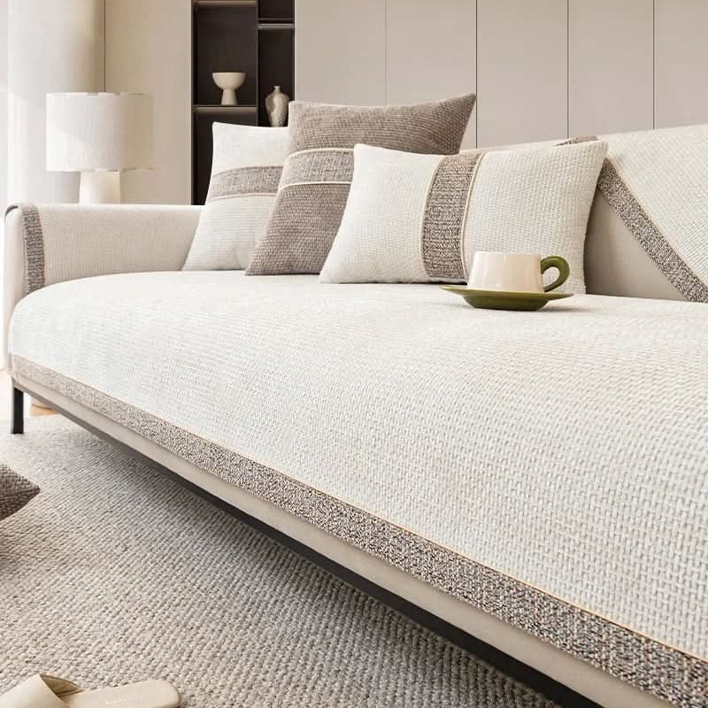 Non-slip linen-texture sofa cover fitted over a couch - product photo 1
