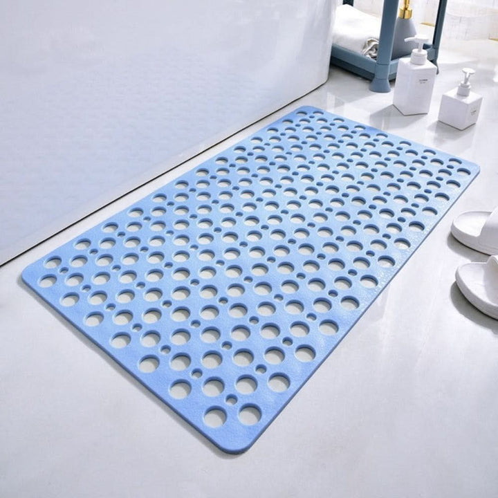 Non-slip shower mat with suction cups and drainage holes in a bathtub - product photo 10