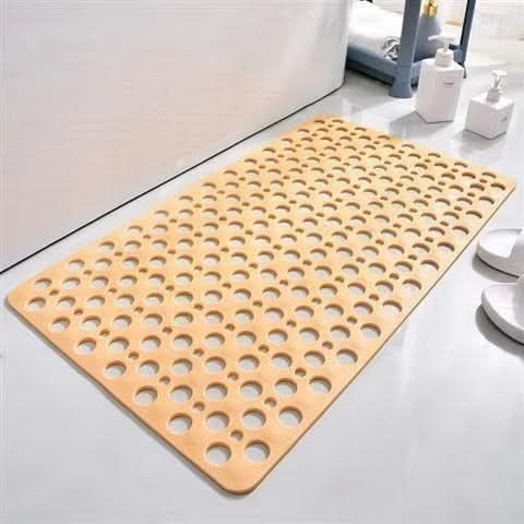 Non-slip shower mat with suction cups and drainage holes in a bathtub - product photo 14