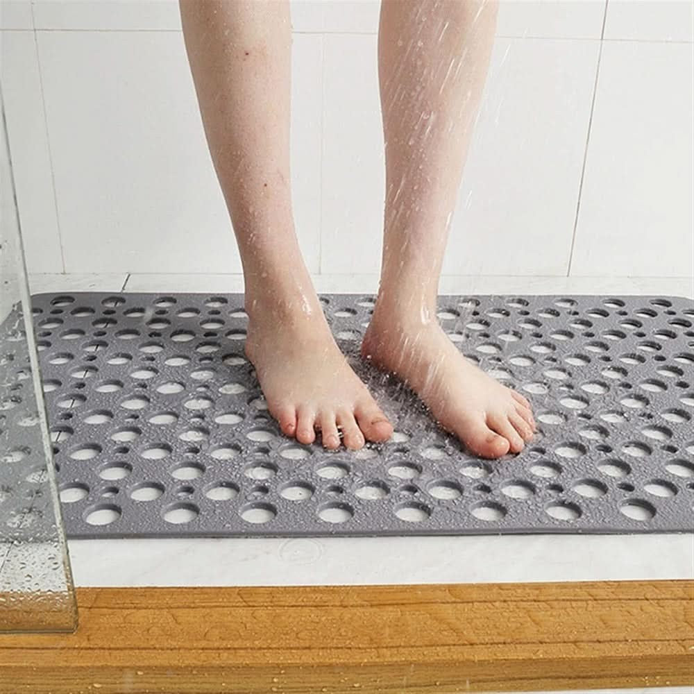 Non-slip shower mat with suction cups and drainage holes in a bathtub - product photo 5