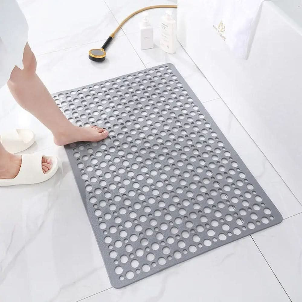 Non-slip shower mat with suction cups and drainage holes in a bathtub - product photo 6