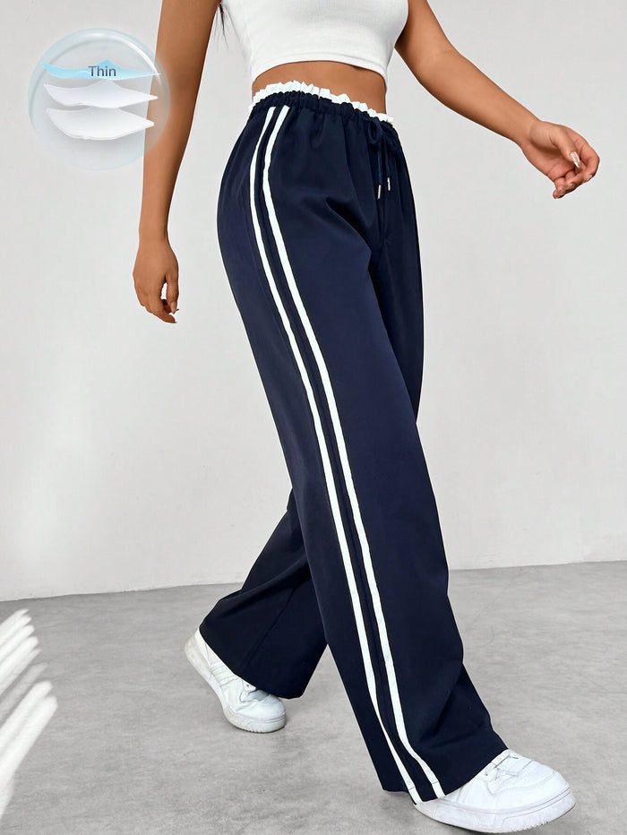 Madison | Women’s Sporty High-Waisted Jogger Pants in Black with White Stripes