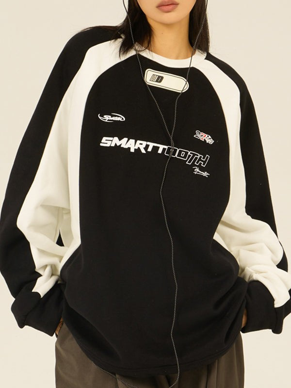 Oversized cotton raglan sweatshirt with contrast sleeves - product photo 1