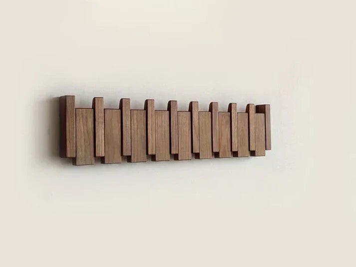 Piano-shaped wooden coat rack mounted on a wall - product photo 7