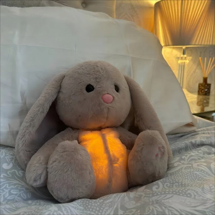 Plush rabbit toy with a soft glow - product photo 2
