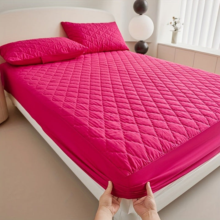 Quilted waterproof mattress protector on a bed - product photo 13