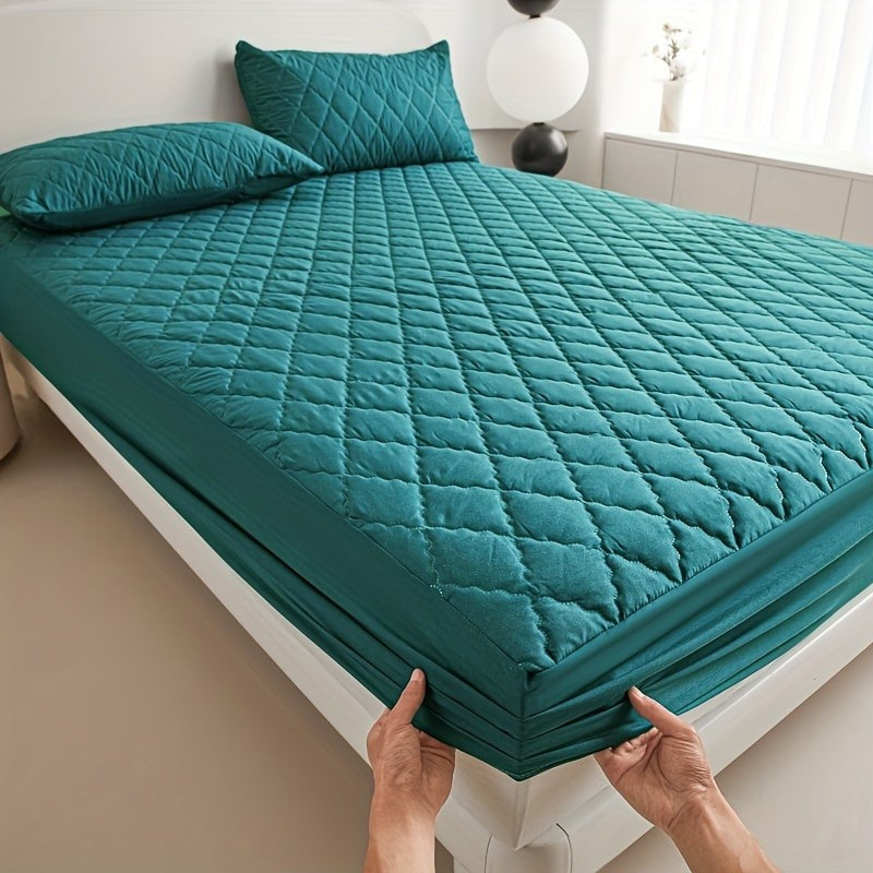 Quilted waterproof mattress protector on a bed - product photo 7