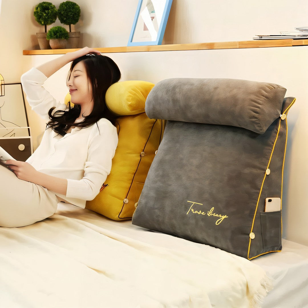 Reading cushion with arms and a side pocket on a bed - product photo 11