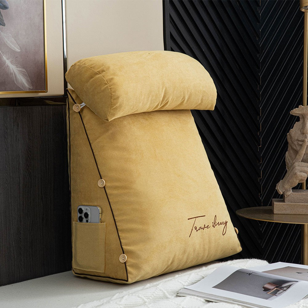 Reading cushion with arms and a side pocket on a bed - product photo 2