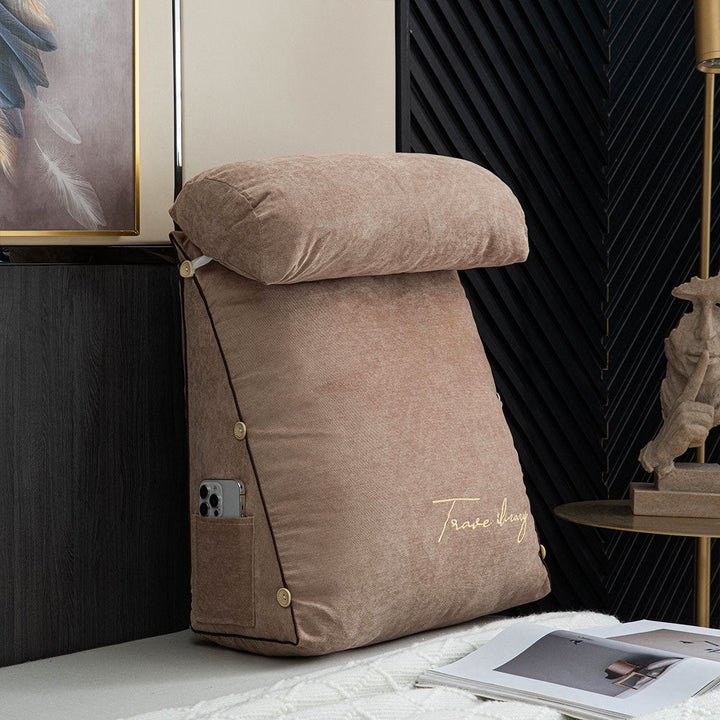 Reading cushion with arms and a side pocket on a bed - product photo 3