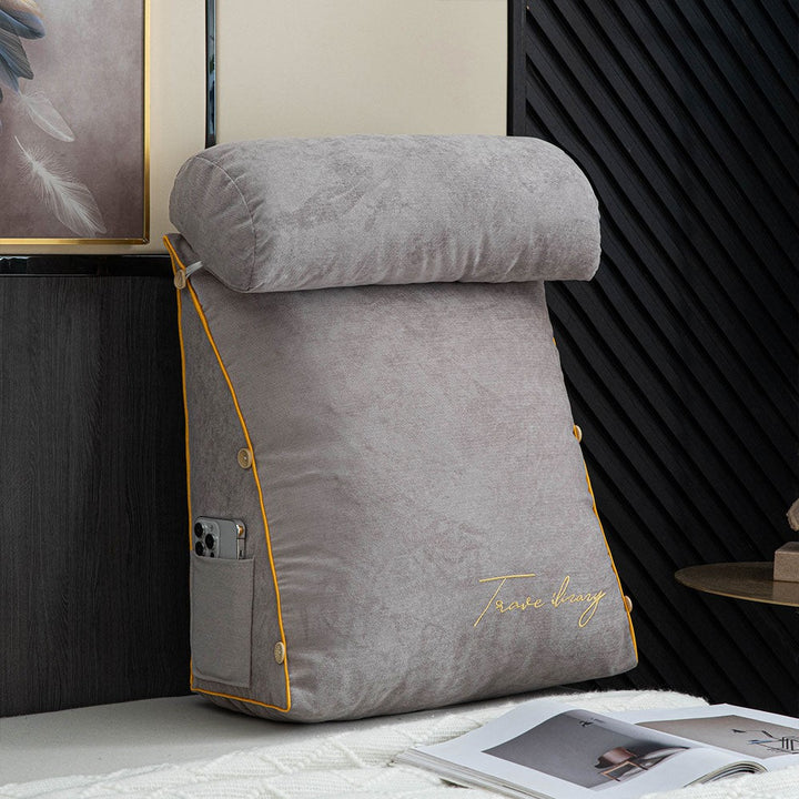 Reading cushion with arms and a side pocket on a bed - product photo 4