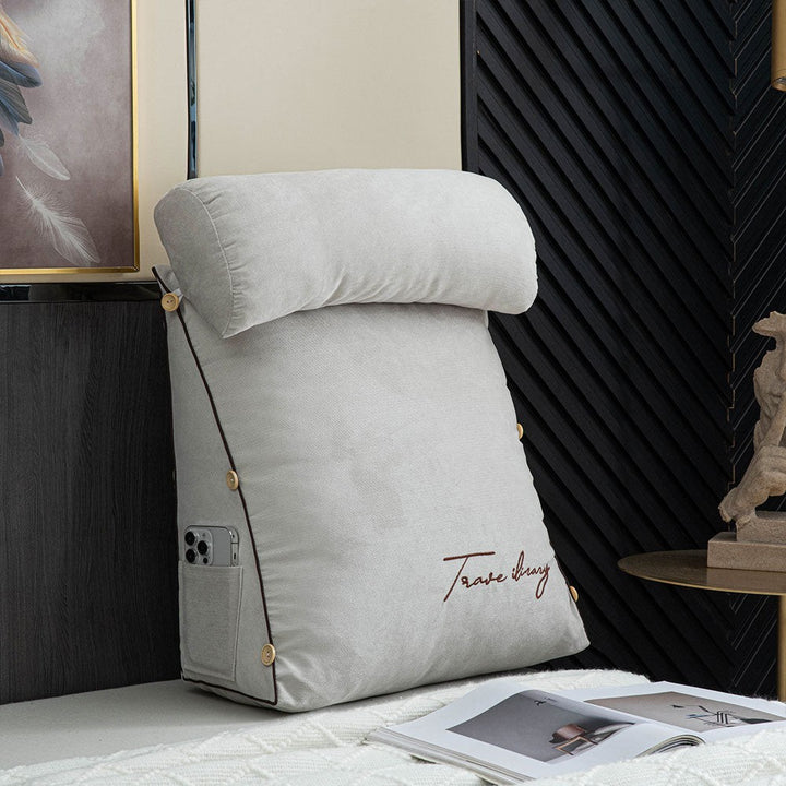 Reading cushion with arms and a side pocket on a bed - product photo 8