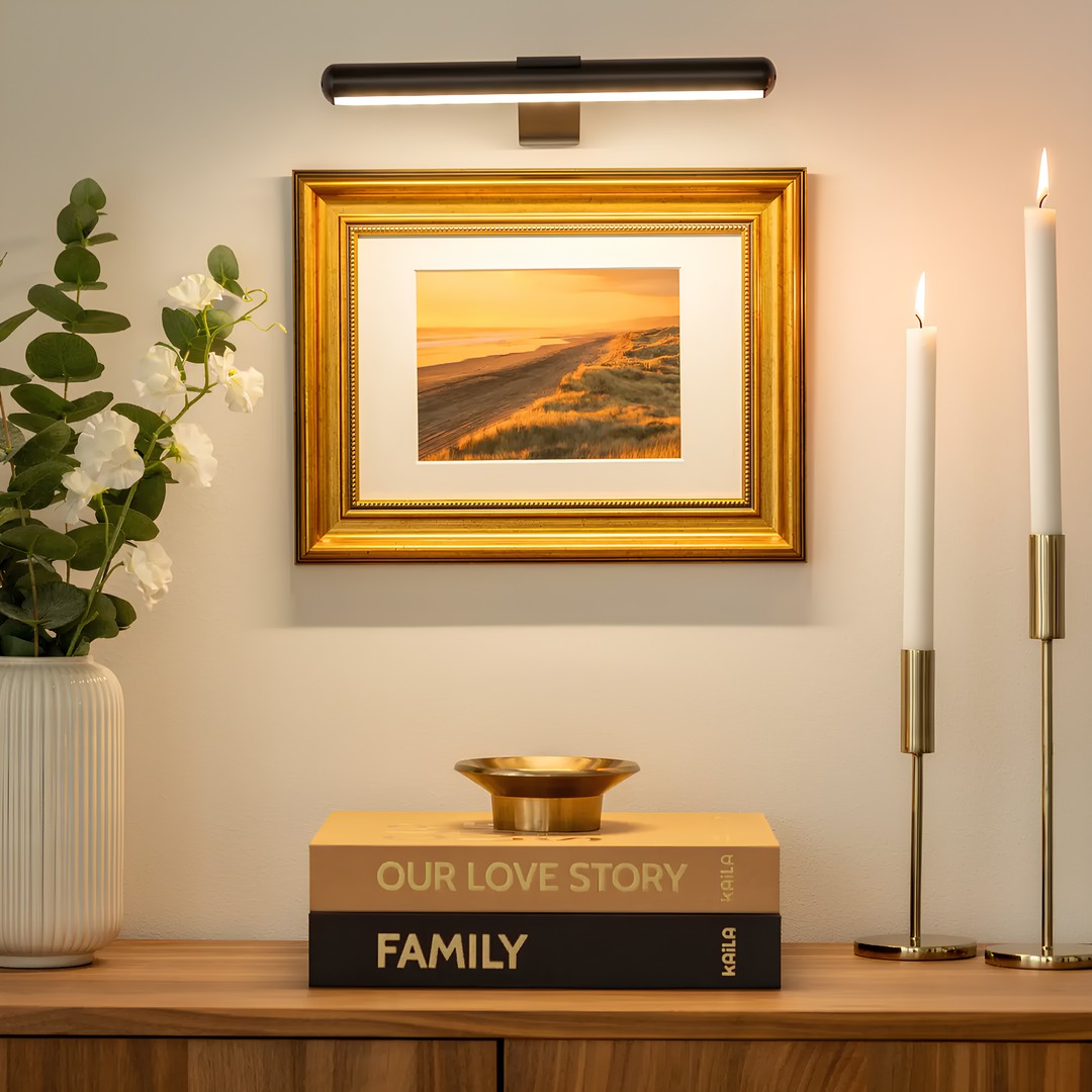 Cordless LED picture light above a framed picture - product photo 1