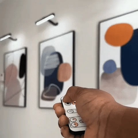 Cordless LED picture light above a framed picture - product photo 4