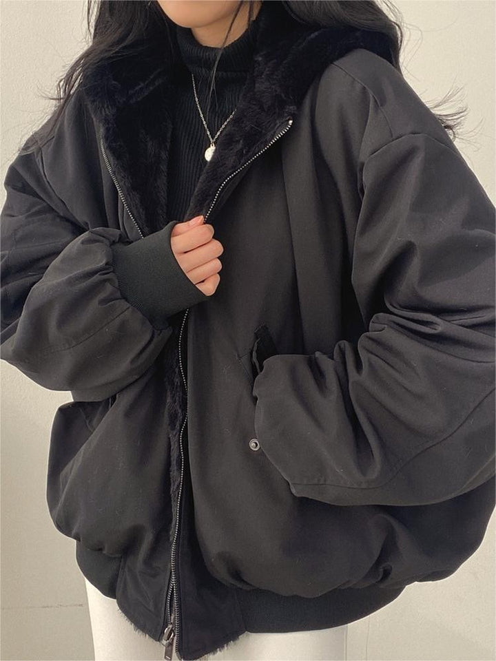 Reversible oversized hooded fleece jacket shown from both sides - product photo 1