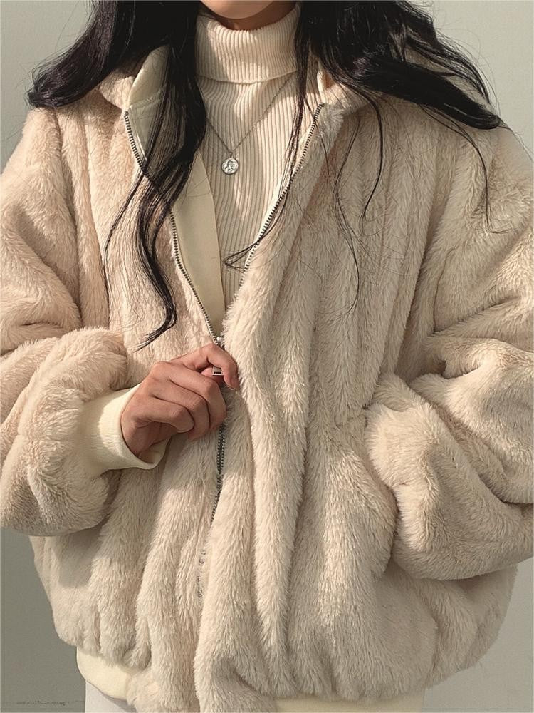 Reversible oversized hooded fleece jacket shown from both sides - product photo 11