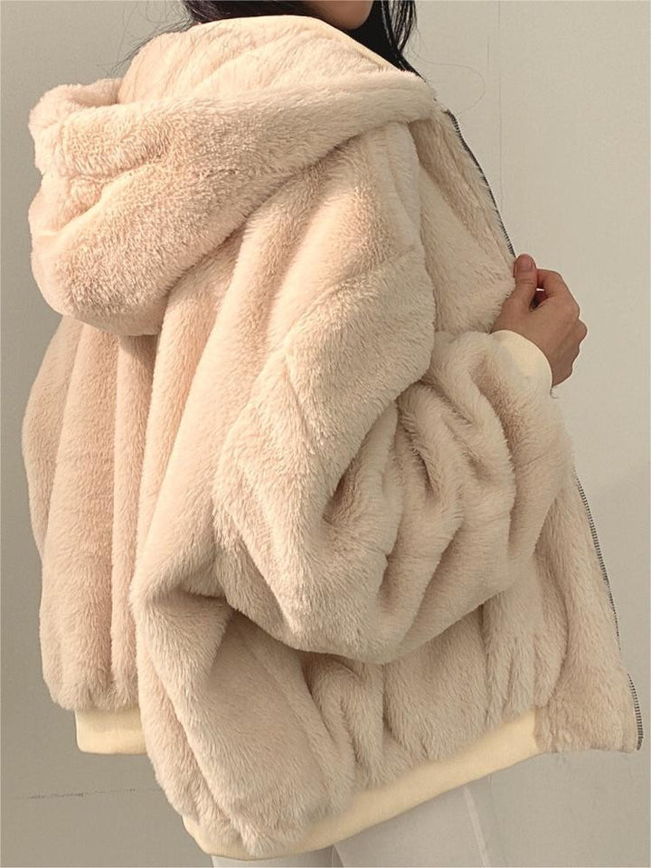 Reversible oversized hooded fleece jacket shown from both sides - product photo 12