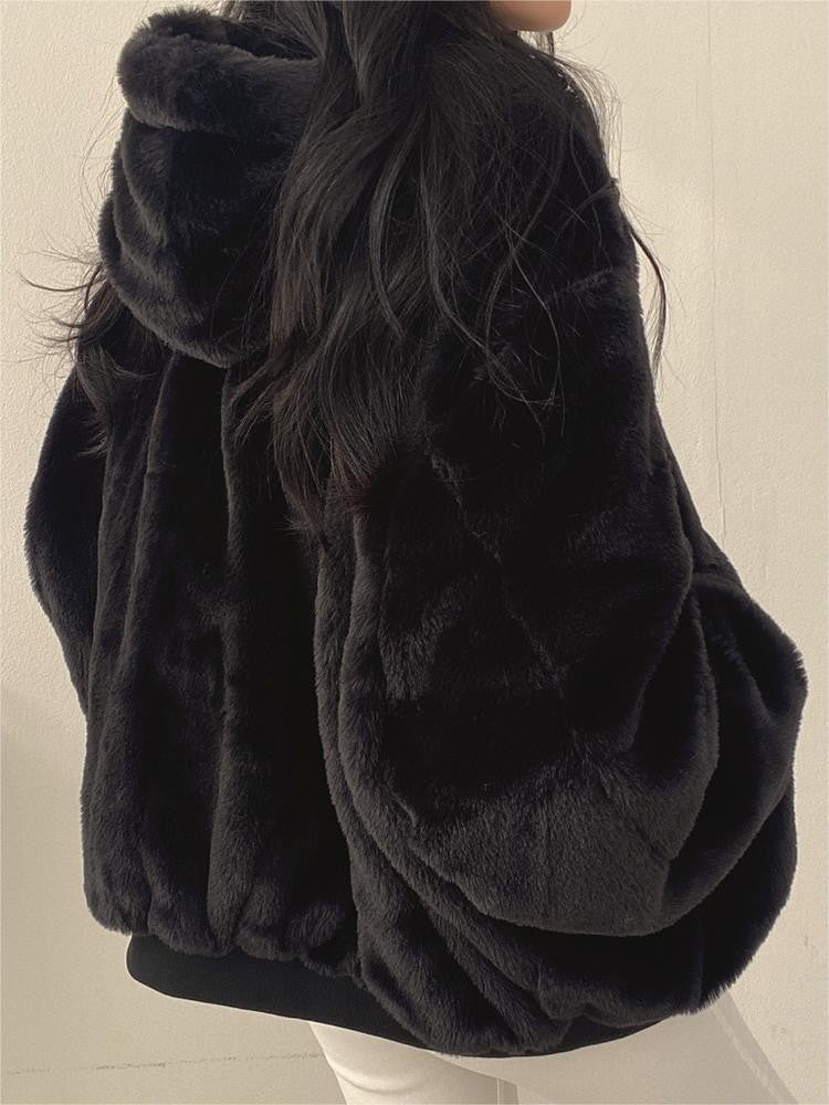 Reversible oversized hooded fleece jacket shown from both sides - product photo 4
