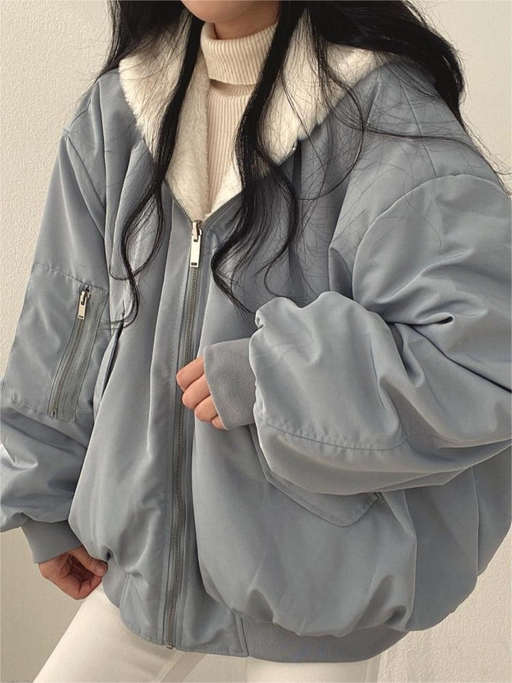 Reversible oversized hooded fleece jacket shown from both sides - product photo 6