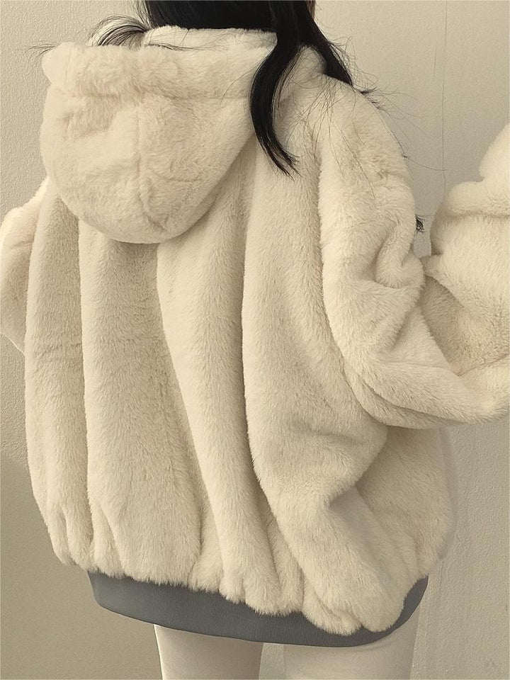 Reversible oversized hooded fleece jacket shown from both sides - product photo 8