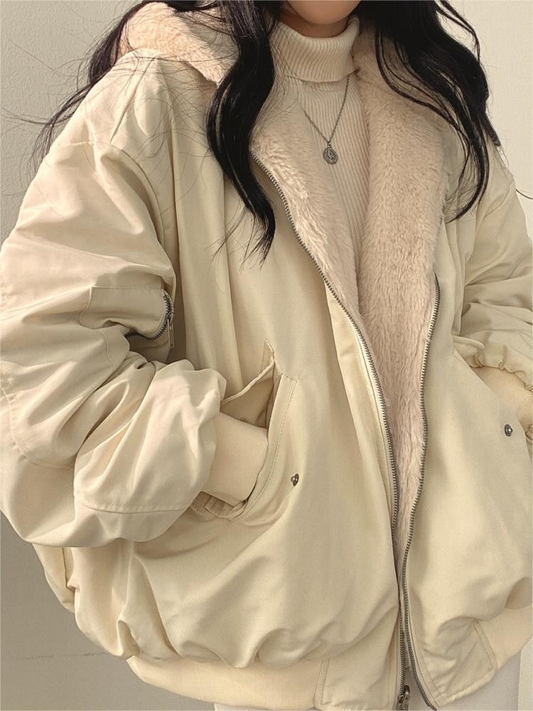 Reversible oversized hooded fleece jacket shown from both sides - product photo 9