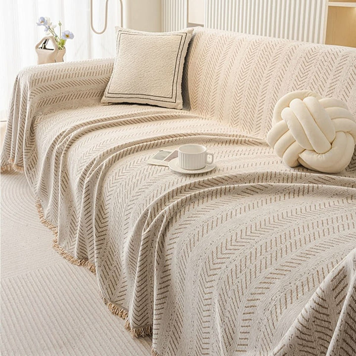 Scratch-resistant chenille sofa cover fitted over a couch - product photo 2