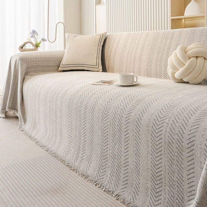 Scratch-resistant chenille sofa cover fitted over a couch - product photo 7