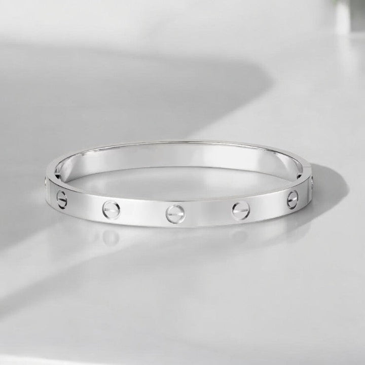 Screw-detail bangle bracelet in a gold tone - product photo 6