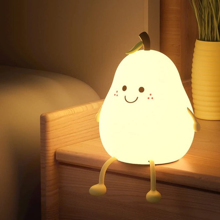 Soft silicone animal night light glowing warm in a nursery - product photo 10