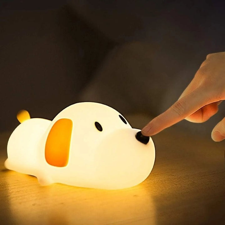 Soft silicone animal night light glowing warm in a nursery - product photo 7