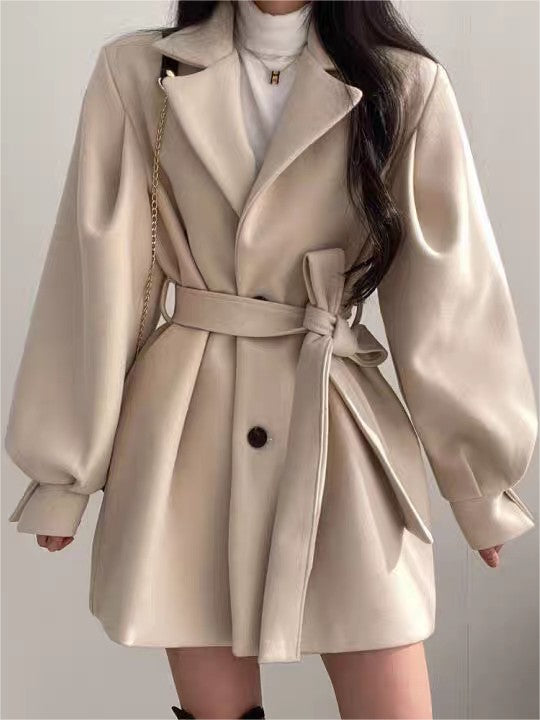 Slim fit coat with lapel collar, puff sleeves and a tie belt - product photo 1