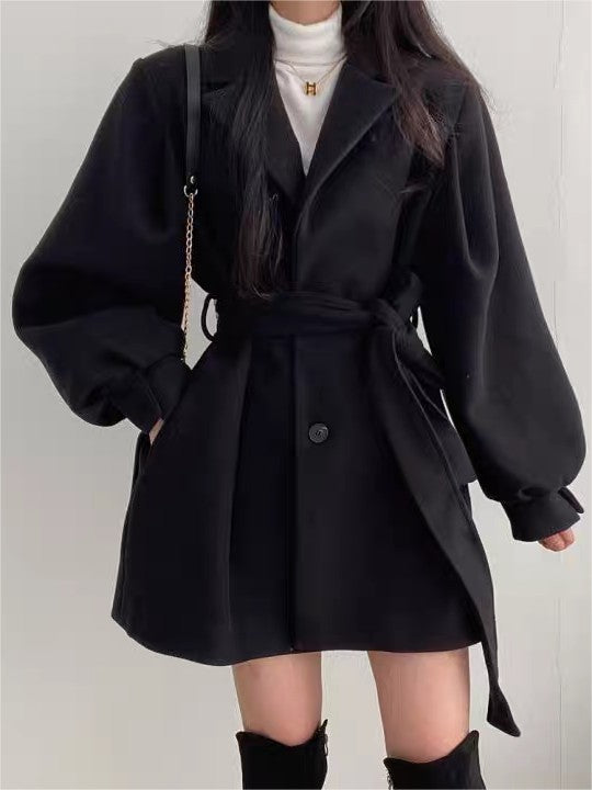 Slim fit coat with lapel collar, puff sleeves and a tie belt - product photo 5