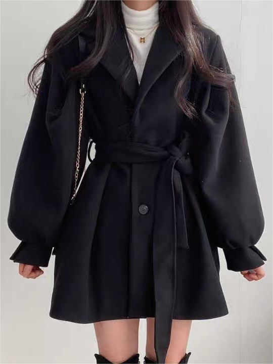 Slim fit coat with lapel collar, puff sleeves and a tie belt - product photo 6