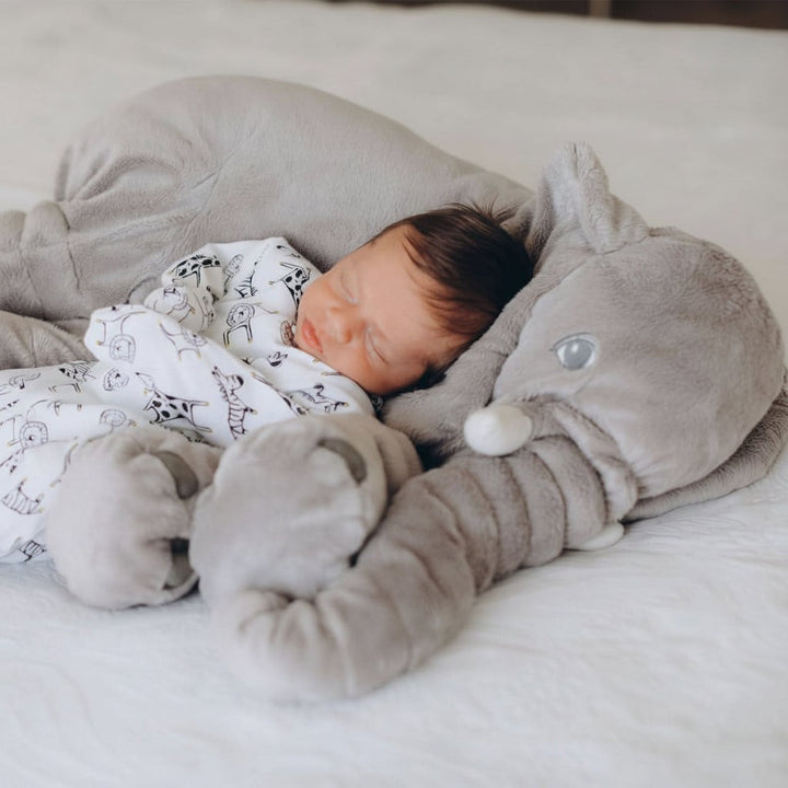Soft plush elephant cuddle pillow in a child's room - product photo 2