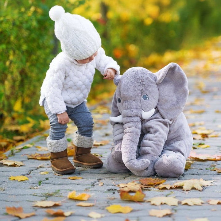 Soft plush elephant cuddle pillow in a child's room - product photo 3