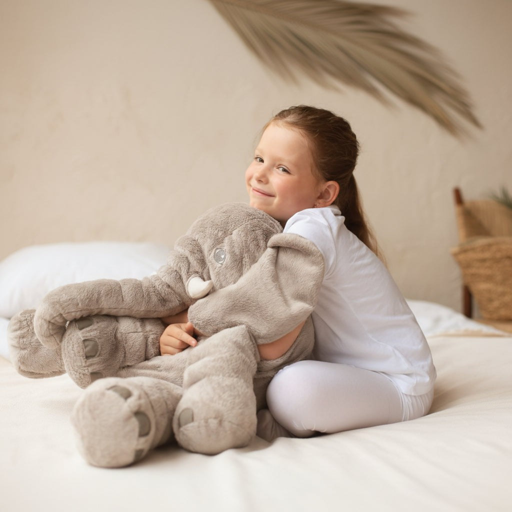 Soft plush elephant cuddle pillow in a child's room - product photo 4
