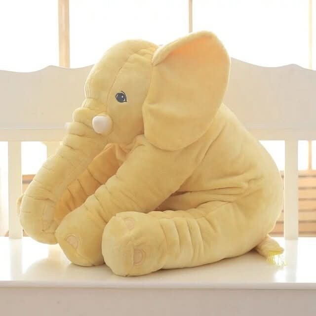 Soft plush elephant cuddle pillow in a child's room - product photo 9