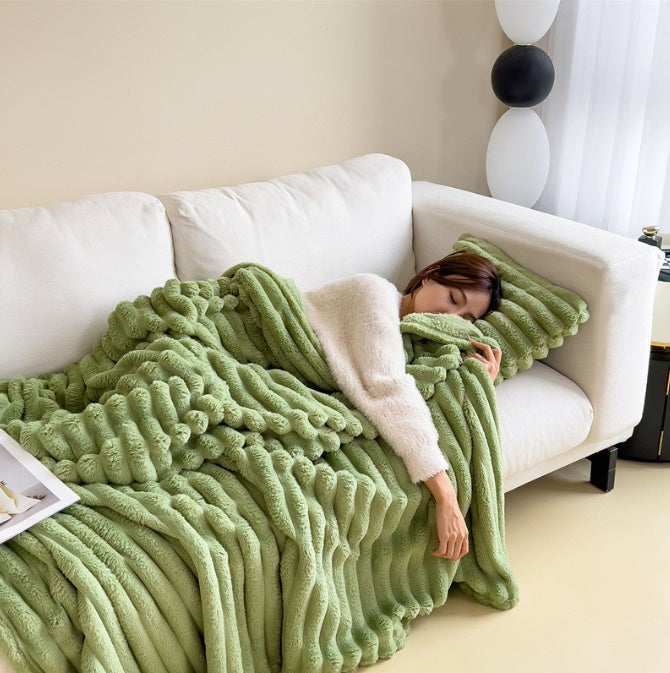 Soft fuzzy throw blanket on a sofa - product photo 7