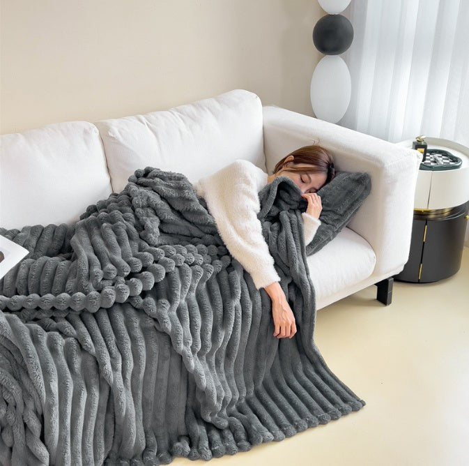 Soft fuzzy throw blanket on a sofa - product photo 8
