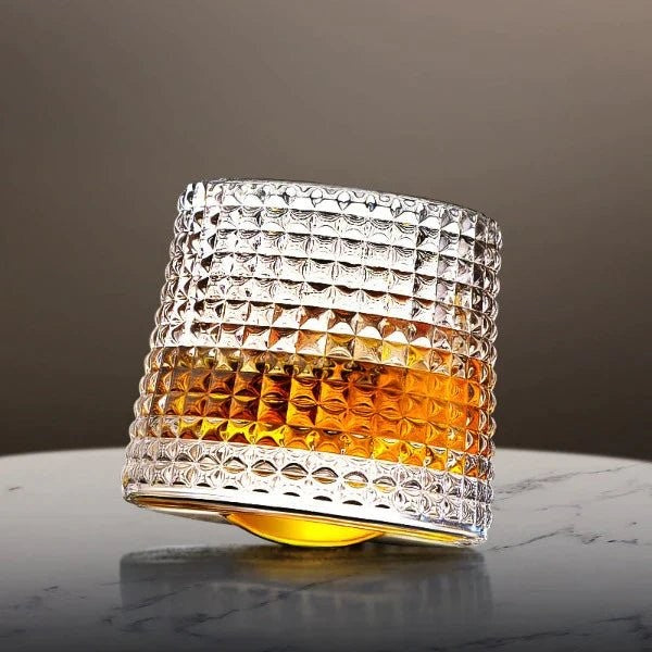 Spinning crystal whiskey glass rocking on its rounded base - product photo 1