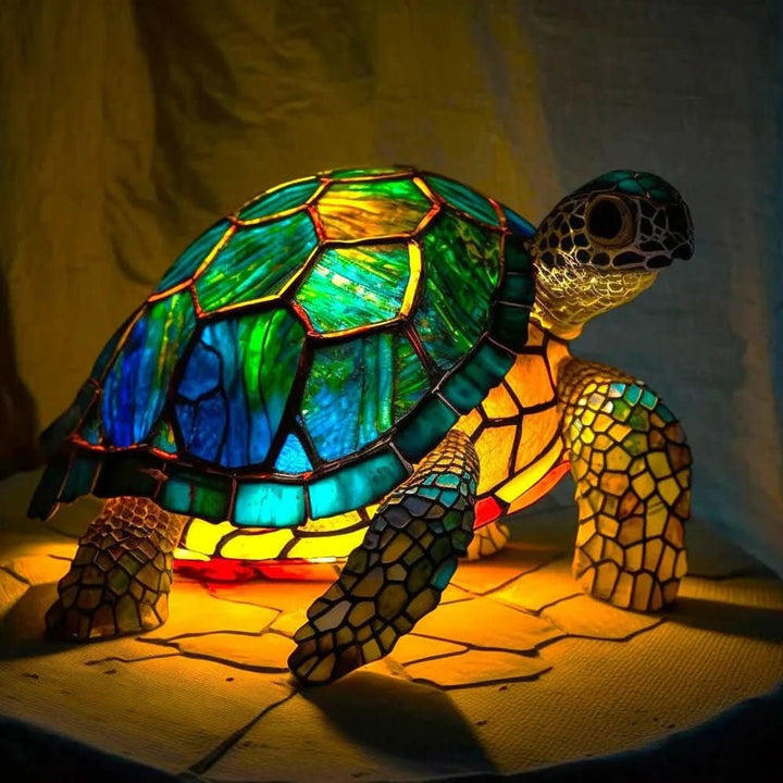 Stained glass animal table lamp glowing amber and green - product photo 11