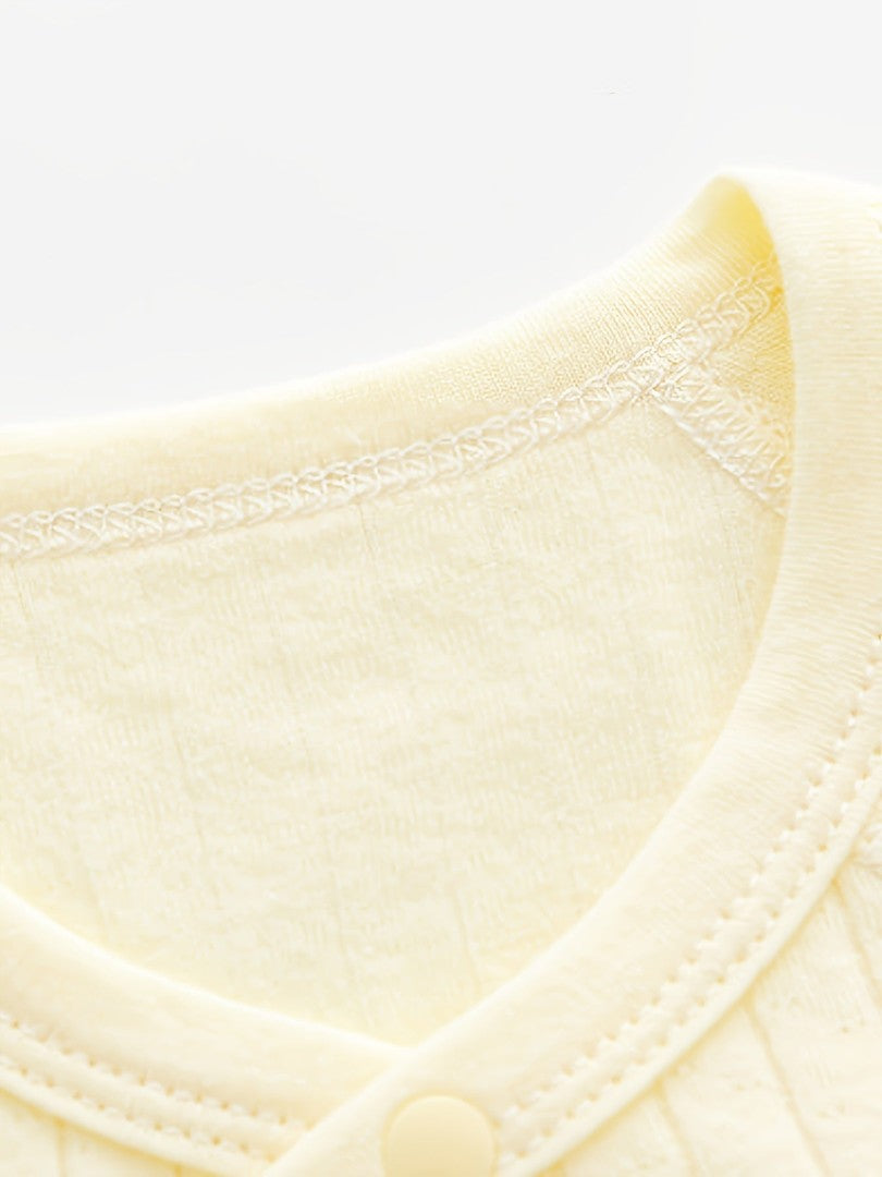 Striped cotton baby romper with a bear patch - product photo 11