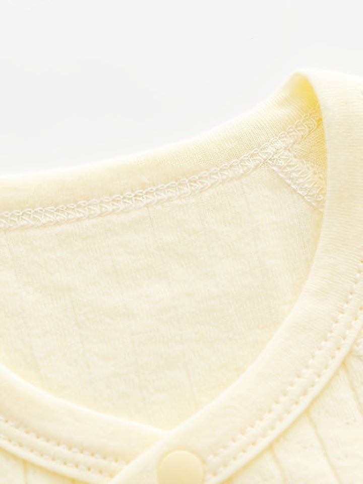 Striped cotton baby romper with a bear patch - product photo 11