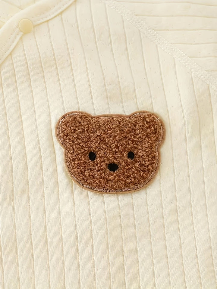 Striped cotton baby romper with a bear patch - product photo 8