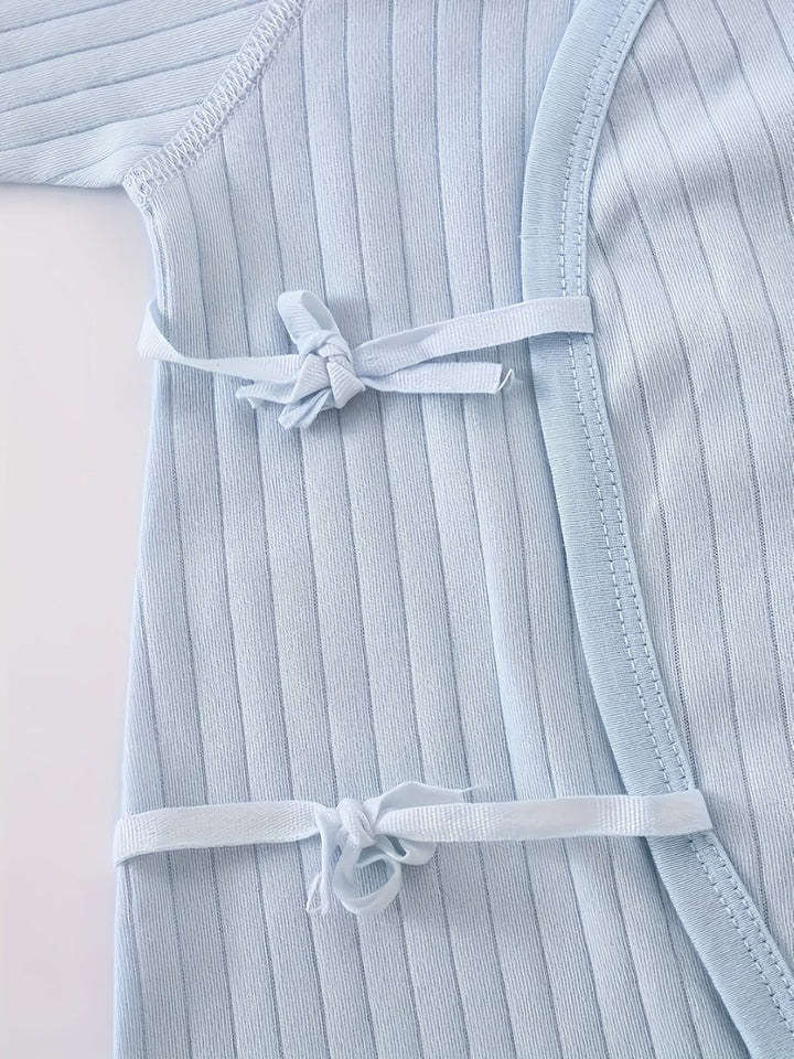 Striped cotton baby romper with a bear patch - product photo 9