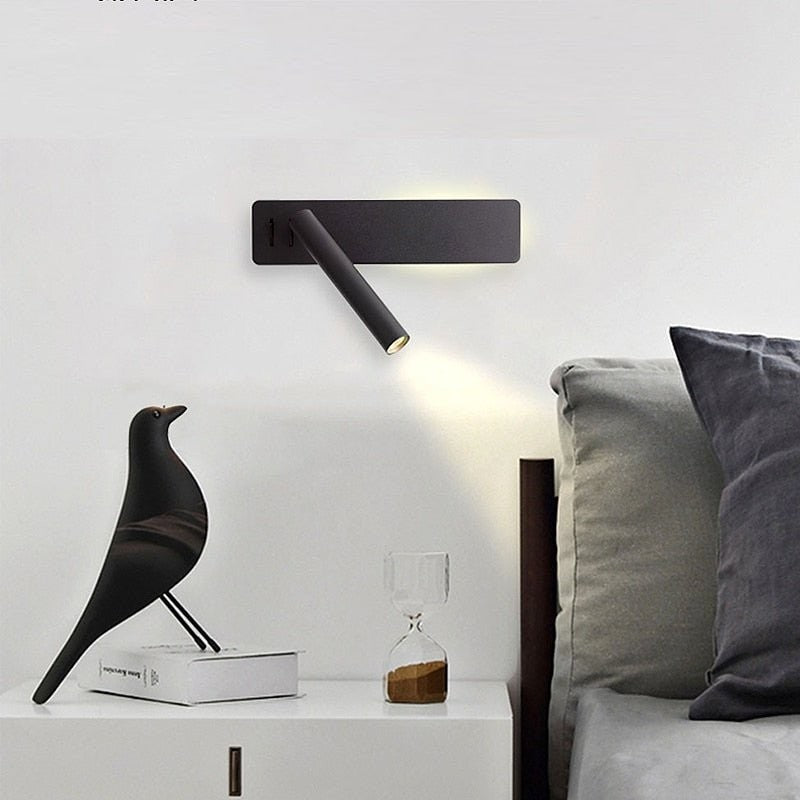 Swivel LED bedside reading light aimed at a book - product photo 4