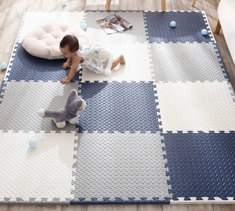 Thick padded baby play mat on a floor - product photo 1
