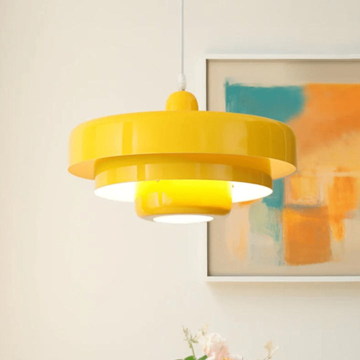 Three-tier pendant light with soft pastel shades over a table - product photo 12