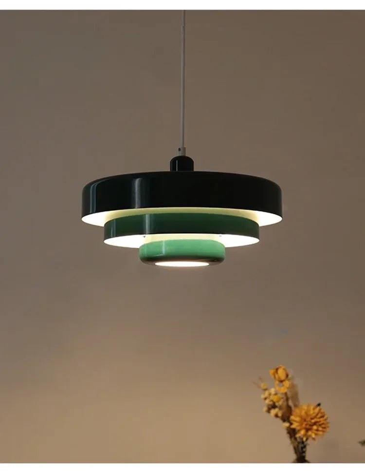 Three-tier pendant light with soft pastel shades over a table - product photo 13